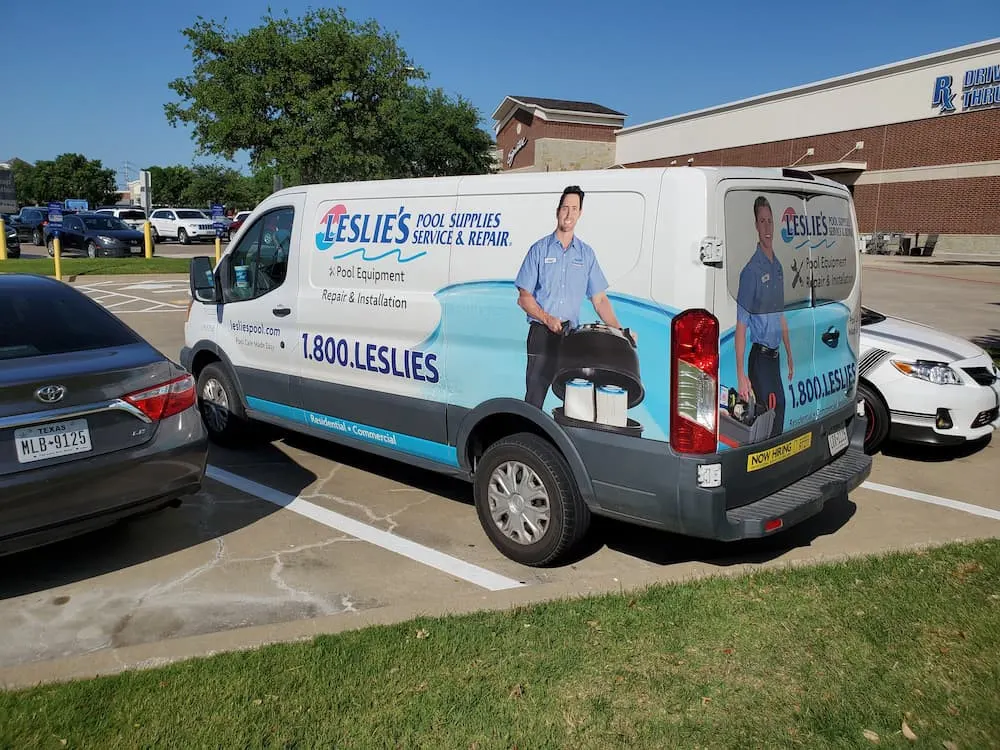 Leslie's Pool Supplies service van with a full vehicle wrap